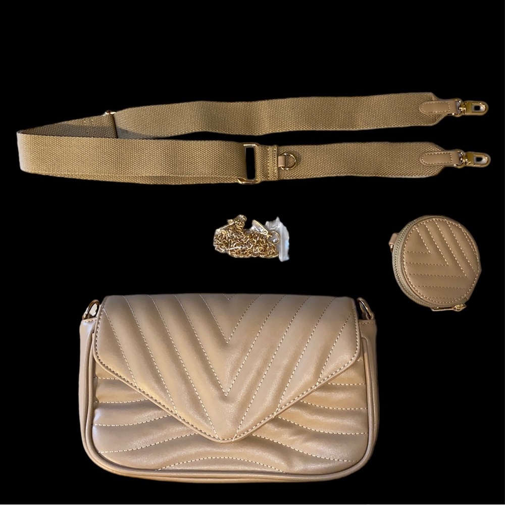 Brand new crossbody bag with accessories. Vegan leather. 10.2x6.6x 3.0 inches.